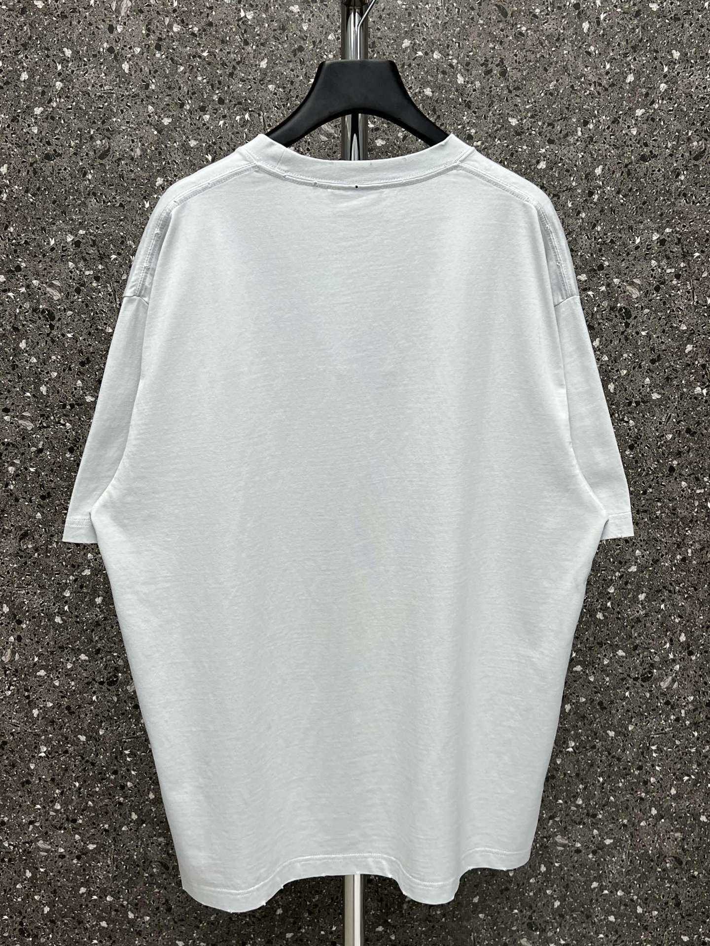 Diseñador nueva camiseta de mujer Edición alta 2023 Verano Agujero roto Camiseta de manga de pareja con estampado de letra de espejo auténtico