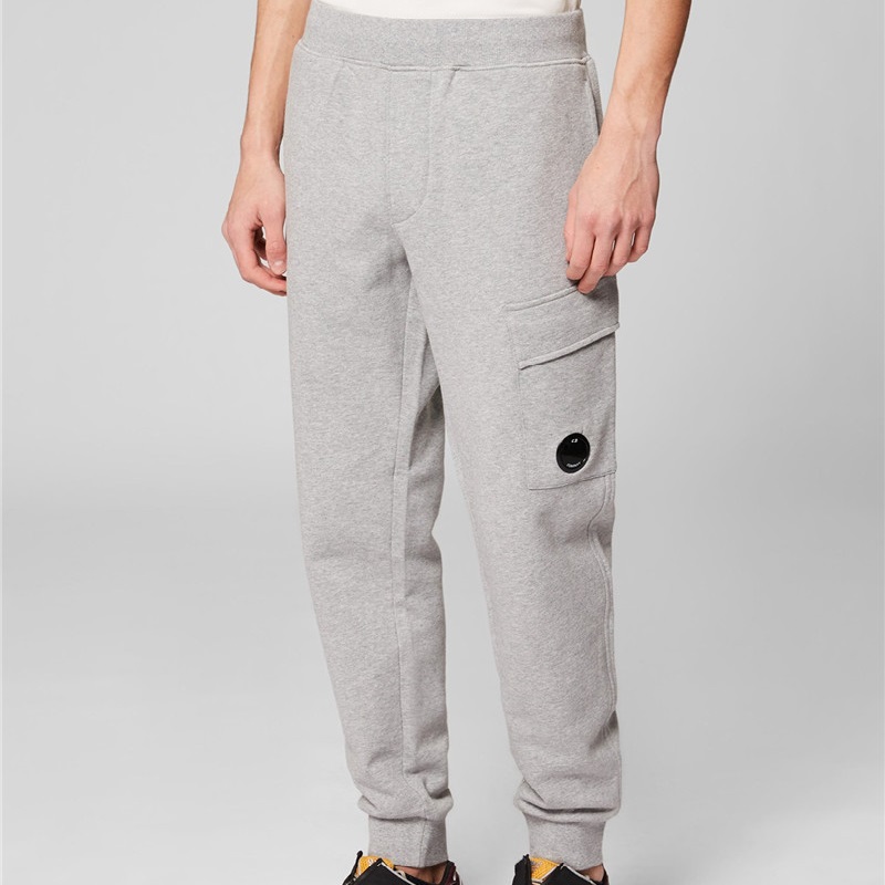Novo designer tático cp calças para homens marca de moda ao ar livre empresa uma lente bolso sweatpant calças luxo