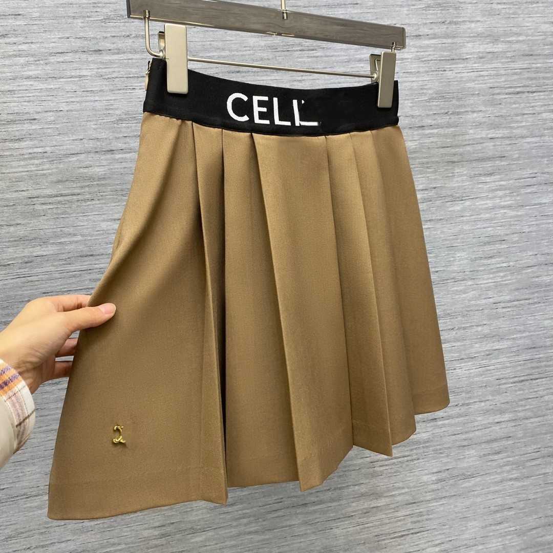 Designer New Women T Shirt Shirt 2023 Early Spring Rubberen Band Taille GeplooDed half voering rok veelzijdig