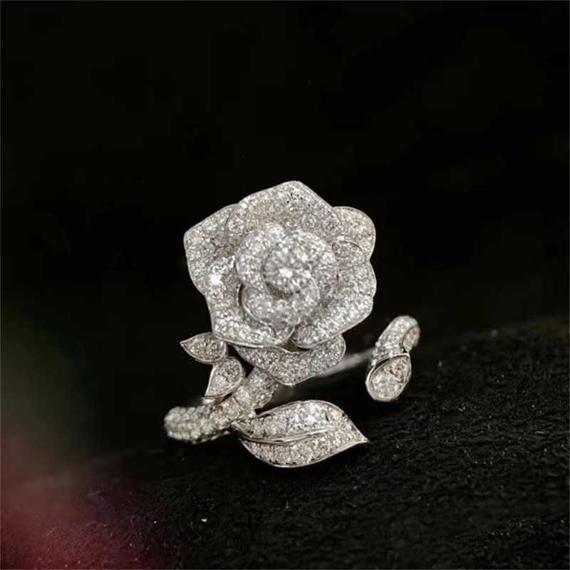 2023 Bästsäljande Vigselringar Lyxsmycken 925 Sterling Silver Pave Vit 5A Cubic Zircon CZ Diamant Ädelstenar Fest Kvinnor Rose Flower Open Justerbar Ring Present