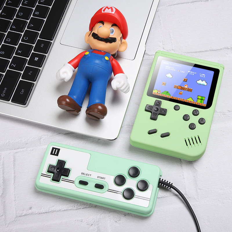 2023 Portable Macaron Handheld Double Players Console de jeu Lecteur vidéo rétro peut stocker 500 jeux en 1 8 bits 3,0 pouces berceau LCD coloré avec contrôleur