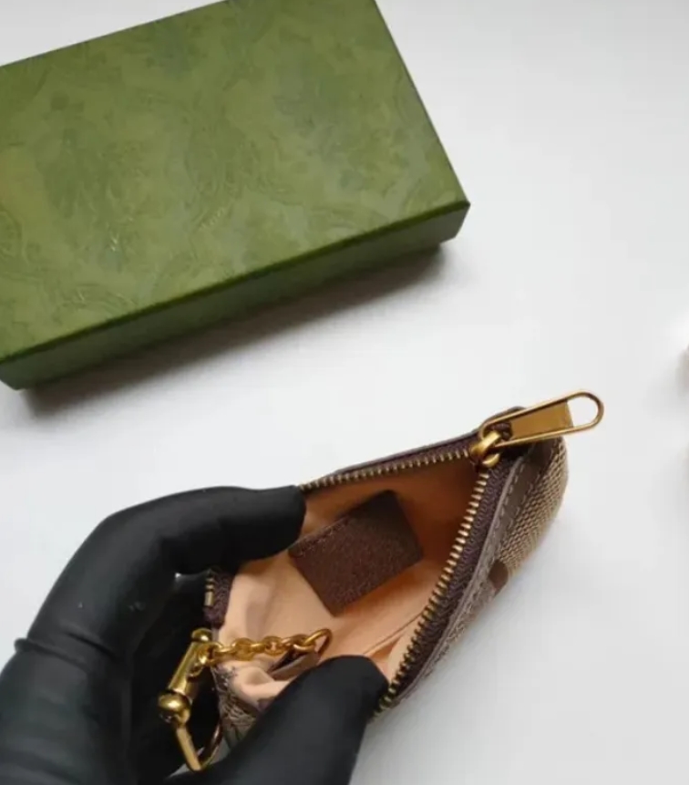7A Kalite Para Çantası Anahtar Cüzdan Pochette Küçük Koruma Tasarımcısı Moda Ruj Çantaları Kadınlar Erkek Anahtar Ring Kredi Kartı Tutucu Lüks Mini Cüzdanlar Çanta Charm 7 Renk
