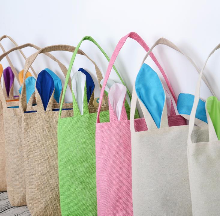 Fournitures de fête Sac de lapin de Pâques pour la chasse aux œufs Panier en toile de jute Fourre-tout Sac à main 14 couleurs Conception d'oreilles à double couche avec matériau en tissu de jute SN4788