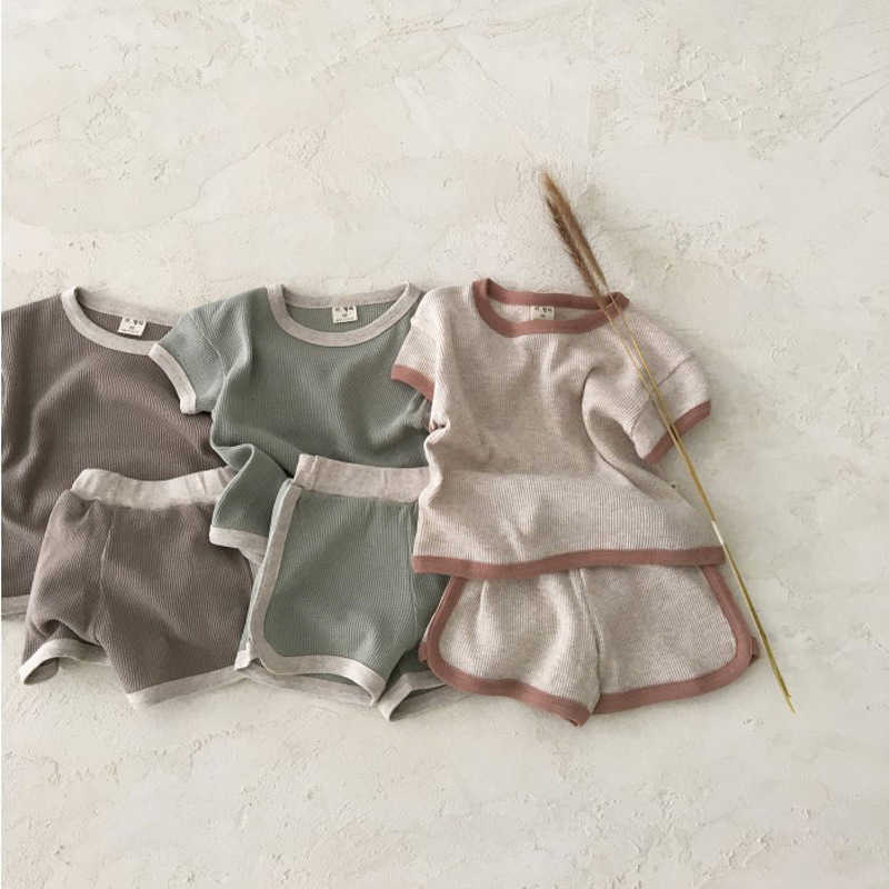 Ensembles de vêtements Vêtements pour enfants coréens pour bébés font de vieilles couleurs Sports de loisirs Costume à manches courtes Ensemble de deux pièces en coton pour hommes et femmes