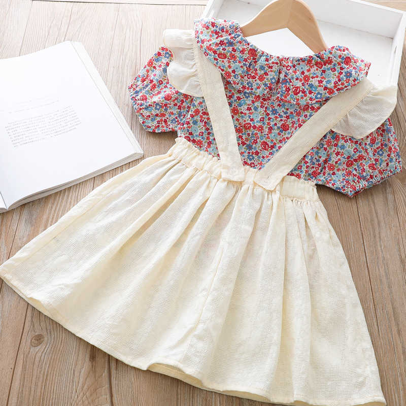 Vêtements d'été nouvelle chemise à revers florale bretelles courtes jupe robe à bretelles costume mode coréenne deux pièces bébé filles vêtements ensembles coton enfants