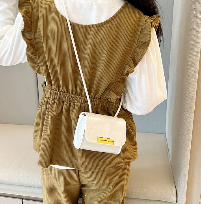2023 Tecknad barn handväska mode baby crossbody messenger väskor mini flickor handväska bra försäljning
