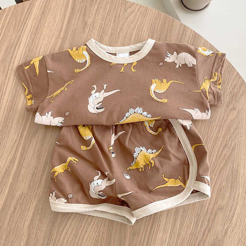 Roupas conjuntos de roupas de verão cartoon dinossauro de dinossauro Terno de manga curta Tampa de algodão infantil shorts de camiseta