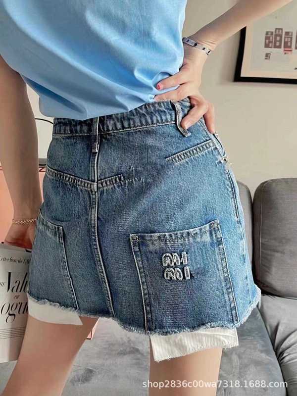 Skirts Designer 22ss style raw edge fake two pieces of three-dimensional embroidery logo washed denim skirt short women RYES