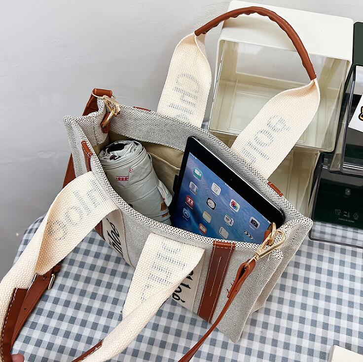 2023 Hot Sell Fashion the Tote Canvas Bag Bag Tour Beach Peach Handbag Counte Bass مع شعار أولي Loe Ch