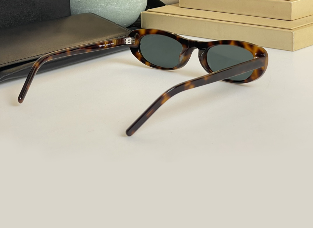 557 tono Acetato ovalado gafas de sol negras mujeres Havana Havana Gafas de sol de soles diseñadores Sunnies Gafas de sol occhiali Da Sole Sunnies U335V