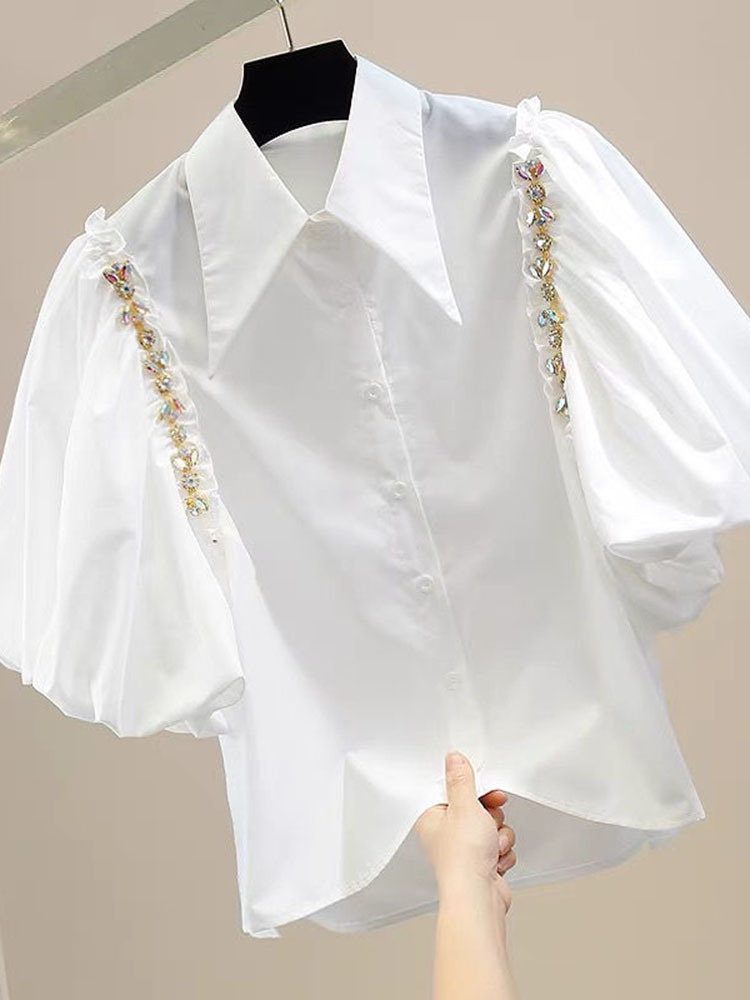 2023 nouveau automne été femmes Blouses mode manches bouffantes diamant incrusté chaîne décoration irrégulière simple boutonnage petit haut