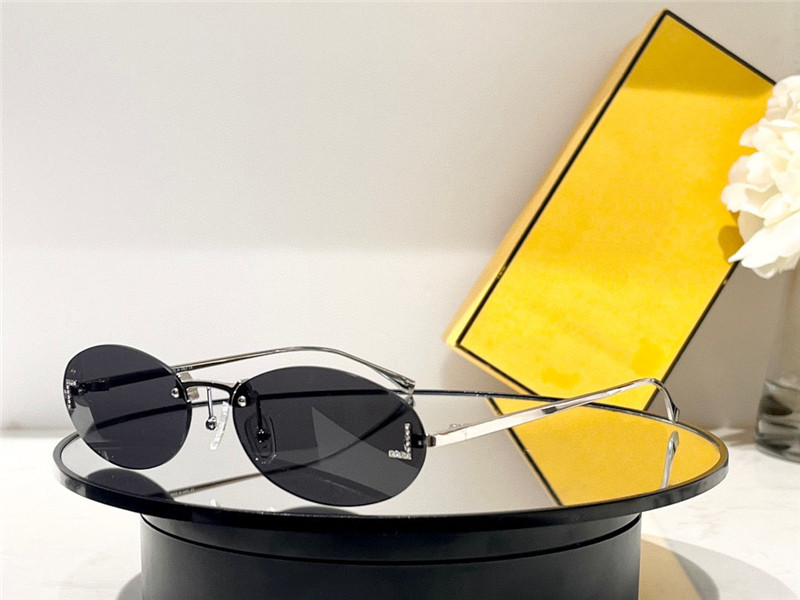 Nowe projektowanie mody owalne okulary przeciwsłoneczne 40046 Mała metalowa rama bez krawędzi popularna i awangardowa styl Outdoor Uv400 Ochrona EyeWear285R