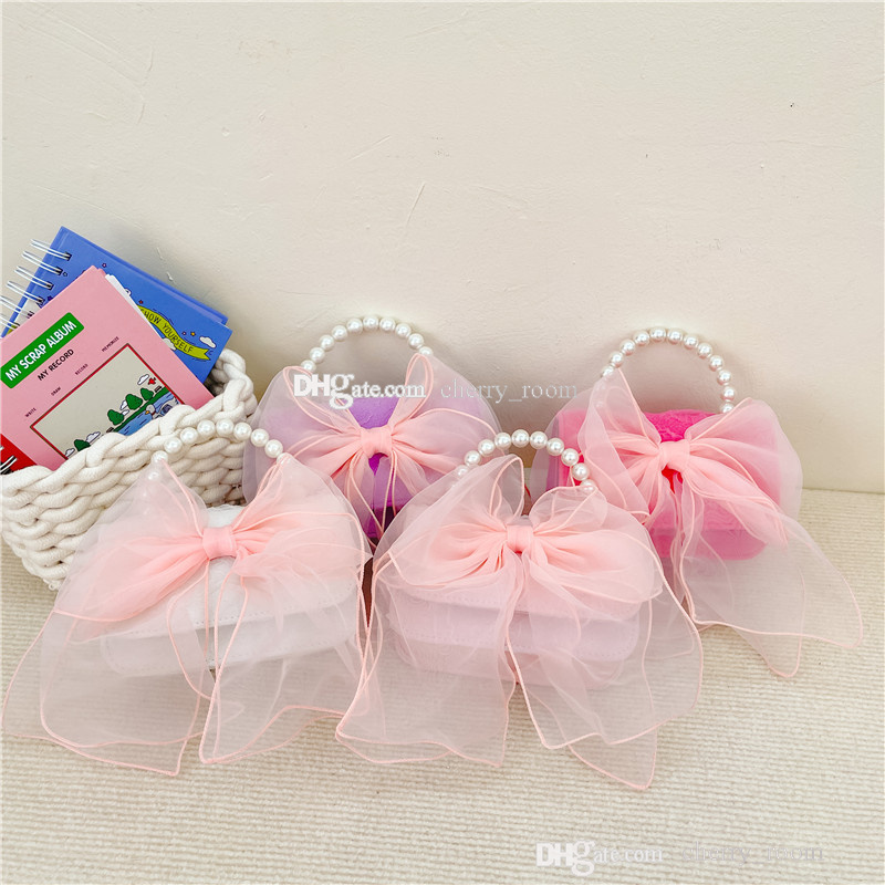 2023 Dziewczyny Butterfly torebki księżniczki wiosna lato Big Bow koronki dzieci Perl Portable Cross Body Bag Fashion Children Torby F1567