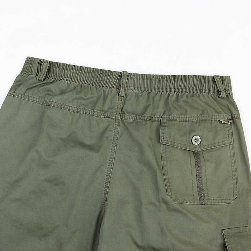 Mäns shorts sommar med flera fickor med dragkedja med en crotch casual Bermuda löst passande mäns råvarukorts plus storlek 5xl p230602