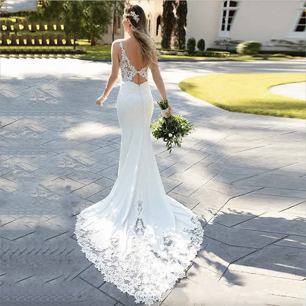 2023 strandbröllopsklänningar brudklänning spaghettiremsjurmaid spets applikation svep tåg rygglös skräddarsydd vestido de novia