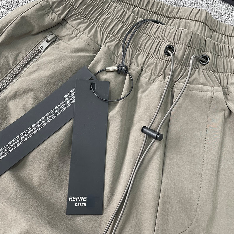 Repre Casual Short Homme Pantalon Cargo Lâche avec Poches Zippées Marque Tendance