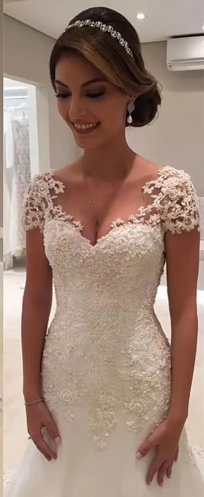 Sexy Off Shoulder Long Sleeves Lace Mermaid Wedding Dresses With Detachable Train Luxury Applique Beaded Dubai Bridal Gowns