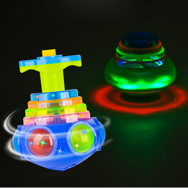 UFO blinkande snurrande toppbarn Gyro Light Up Toy Kids Piggy Led Music GyroScope Launcher Rotating Toys Fun Birthday Party Favors