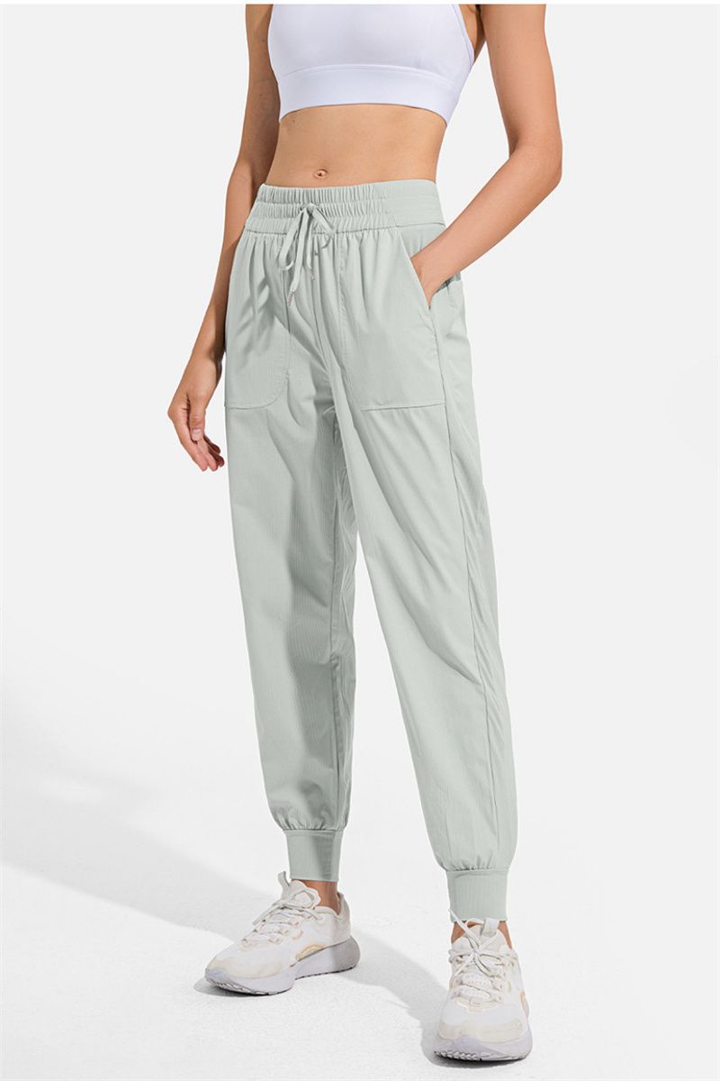 Designer ll mulheres jogging calças de yoga com bolsos macios cintura alta hip lift elástico casual sweatpants perfeito para fitness e yoga pernas com cordão para ajuste ajustável