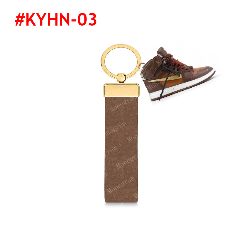 2023 Keychain de diseñador 65221 con llave de zapatilla de zapatilla de llave con llaves de cuero hechos a mano Bolsas de mujeres accesorios colgantes #Kyhn-01 con caja y bolsa de polvo