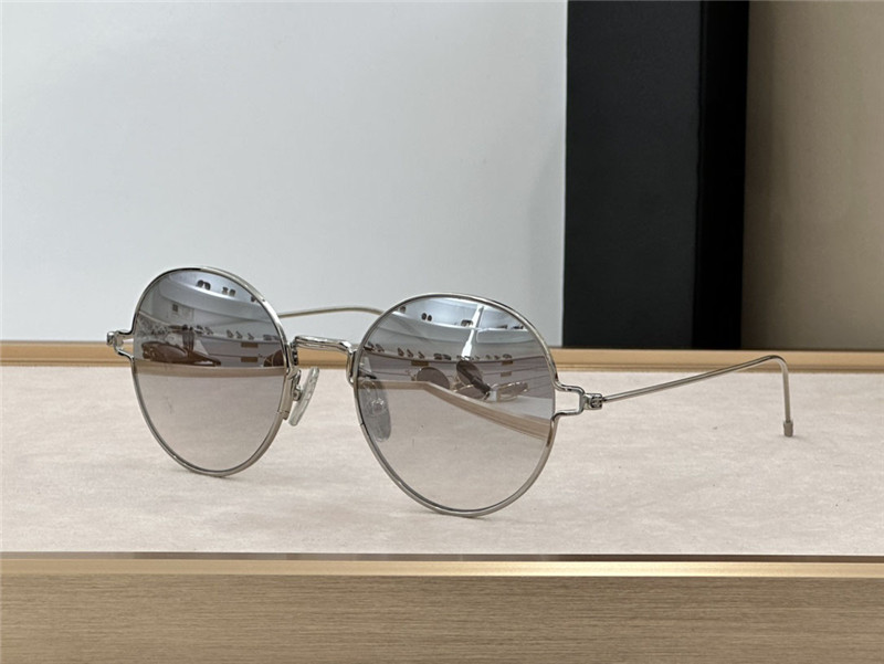 Occhiali da sole rotondi dal nuovo design alla moda 915 squisita montatura in metallo occhiali di protezione UV400 esterni in stile semplice e popolare