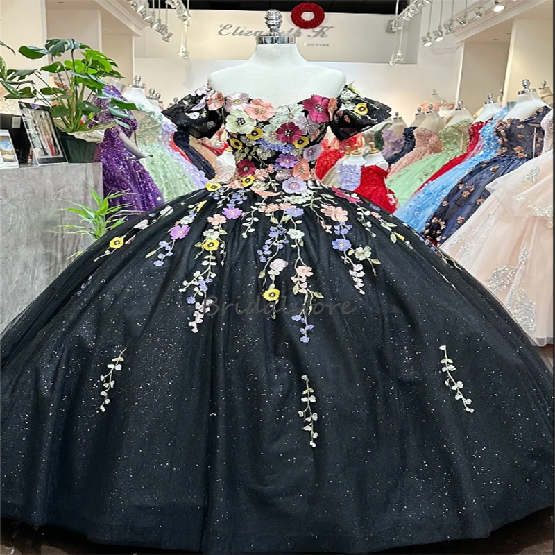 Glänzendes schwarzes mexikanisches Quinceanera-Kleid Charro 2024 mit bunten Blumen und Glitzer-Pailletten