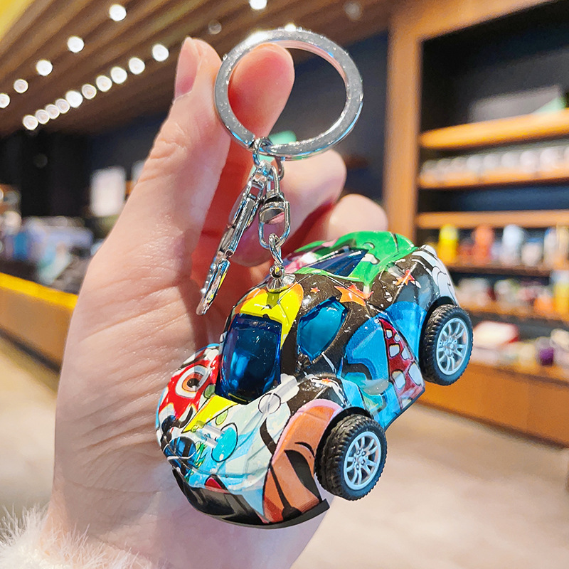 Creative alloy patterned rebound sports car keychain exquisite car keychain hanging accessories bags hanging decorations small gifts