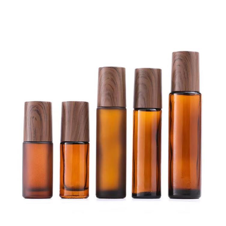 5 ml 10 ml 15 ml bouteilles à bille en verre ambré bouchon en plastique à grain de bois bouteille de parfum d'huile essentielle givrée avec bille roulante en acier inoxydable SN5293
