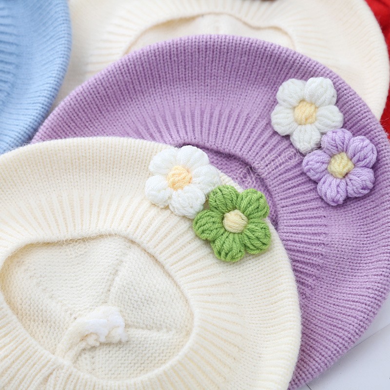 Nuovo bel fiore lavorato a maglia berretto da bambino cappello inverno primavera morbido cotone grande fiore cappello da bambina berretti berretti da pittore