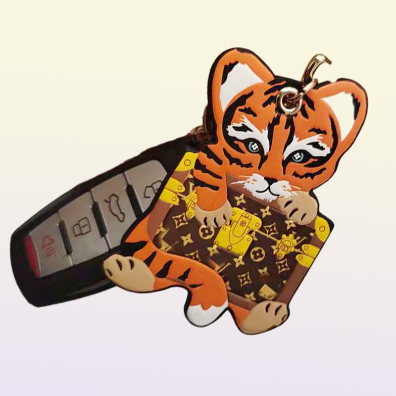 Anneau clé Classic Classic Pink Bull Tiger Tiger Leather Keychain Fashion Migne Cartoon Mobile Phone Sac Car Keychains Pendant Accessoires Pendange9093265