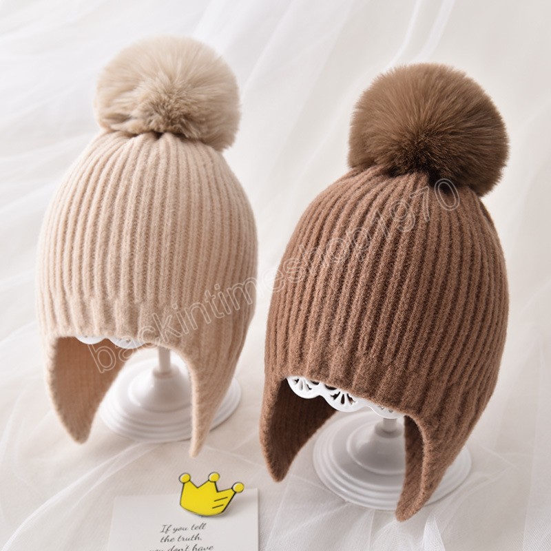 Vinter baby beanie hatt med öronflup päls boll vinter ull stickade hattar för barn utomhus varma flickor pojkar öronskydd mössa