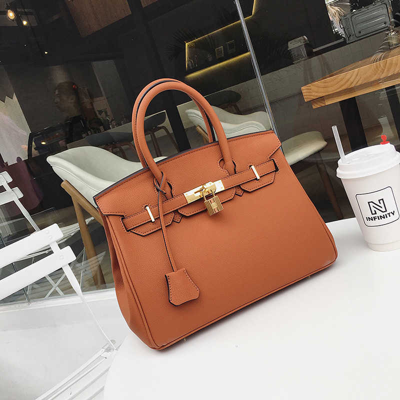 Designer women's handbag 2023 New Fashion Litchi Pattern Handbag Stylish and Versatile One Shoulder Crossbody Casual Women's Bag