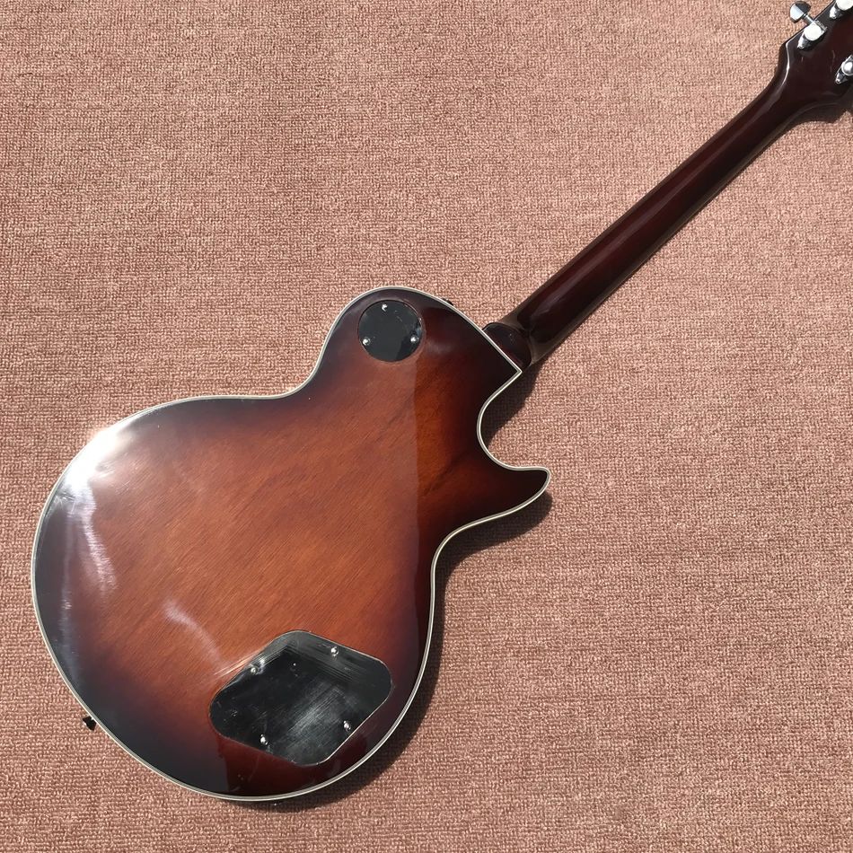 Chitarra elettrica personalizzata mano sinistra, top in acero nuvolato, tastiera in palissandro intarsiato in abalone marrone, rilegatura tasti, Tune-o-Core 00