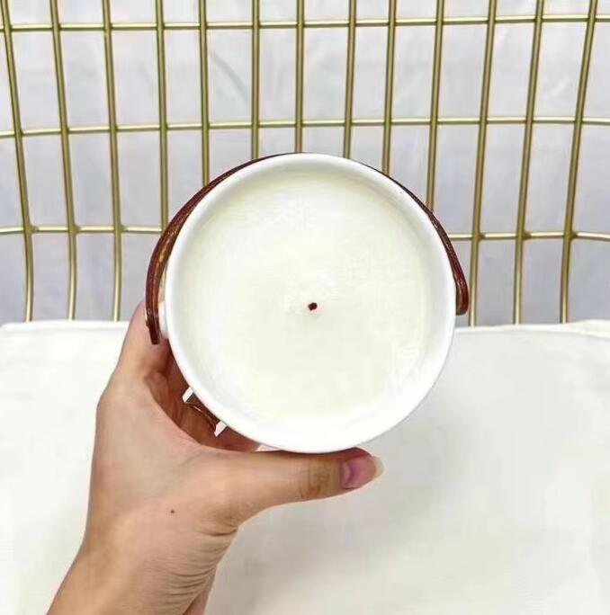 Candela aromaterapia di alta qualità 220G Marchio francese profumo dall'odore gradevole Foglie d'oro Giardino White Island Finestra d'aria Fragranza duratura della neve