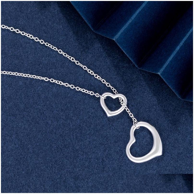 Pendant Necklaces Pendant Necklaces Womens Love Designer Jewelry For Women Double Hearts Necklace Complete Brand As Wedding Christmas Gift T Home Drop Ot3Cv 9H5Q