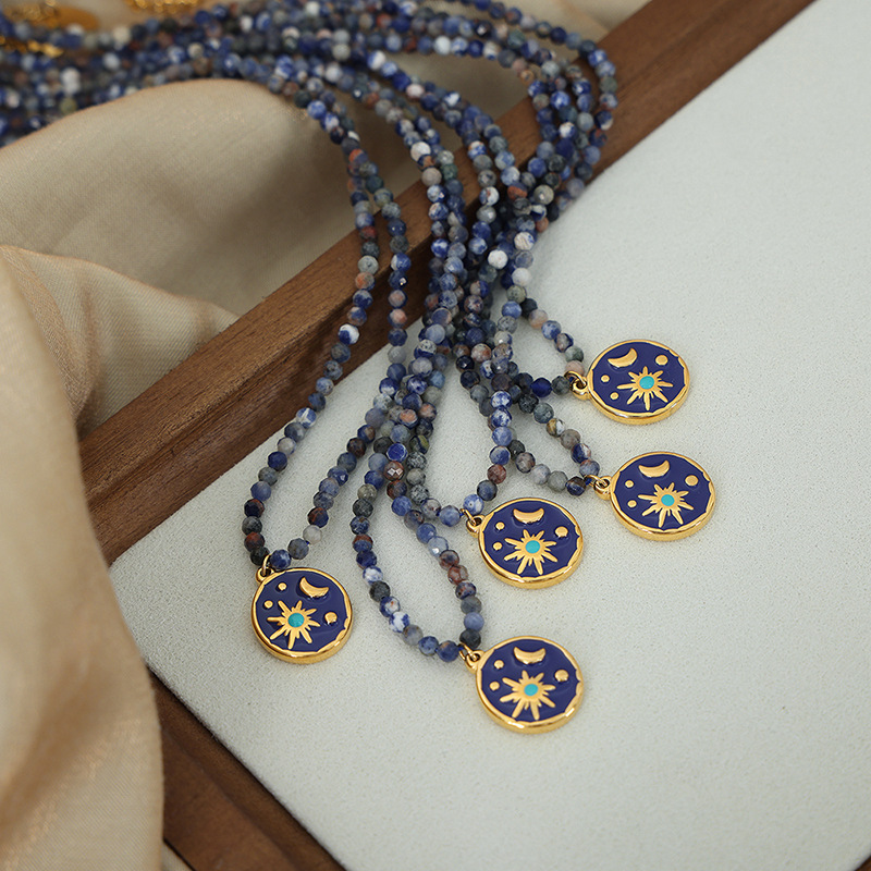 Europe and the United States niche blue spirit gray natural stone hand-beaded design starry sky glazed angel pendant titanium steel gold-plated necklace
