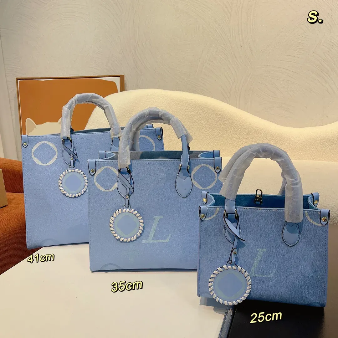 Borsa da donna di lusso firmata Sunrise PM the Totes Borsa a tracolla Borsa da donna colorata firmata go 2023 PRIMAVERA IN CITTÀ Custodia a croce di colore sfumato