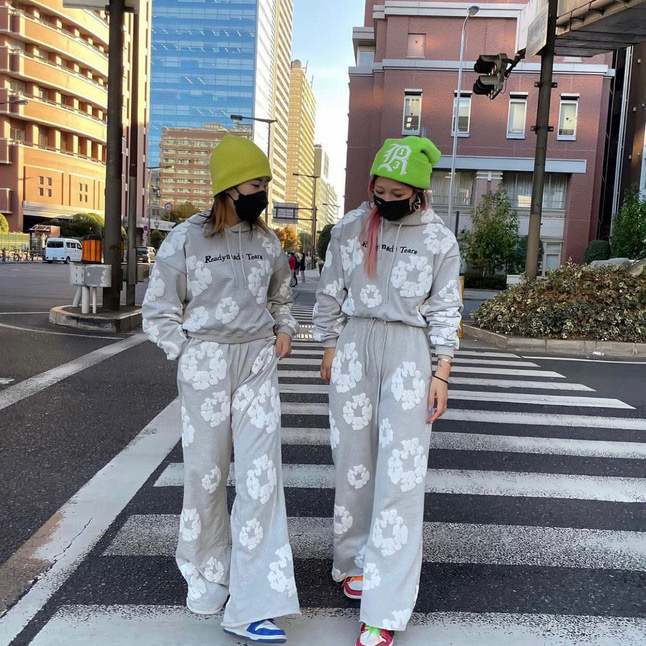 Pantaloni da uomo autunnali e invernali Readymade Foam Flower Co Branded Denim Tears Donna Puff stampato Distressed Pullover Cap Ricamo Bianco Kapok Tidal pantaloni a zampa d'elefante