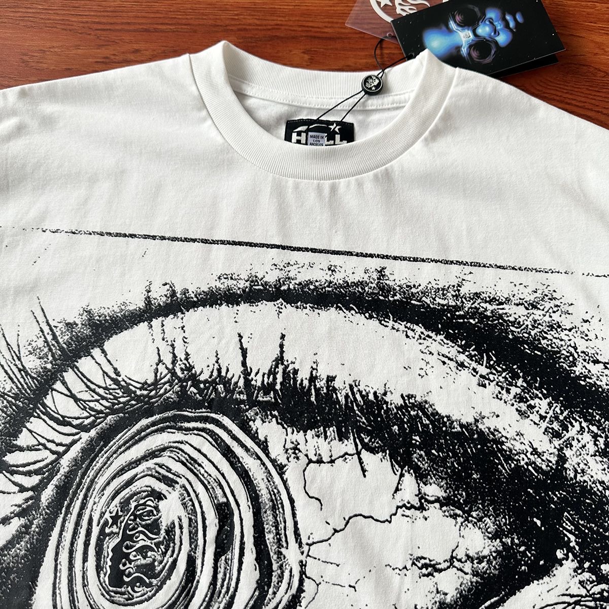 Hellstar Studios Eye Letters Carattere Graffiti Stampa astratta T-shirt casual semplice a maniche corte T-shirt High Street Rapper nero Heavy Craft Unisex Manica corta SMLXL