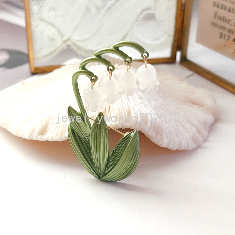 Broches de orquídeas y campana de diseño elegante para mujer, broche de planta con hojas verdes de lirio del valle, accesorios de ropa, joyería