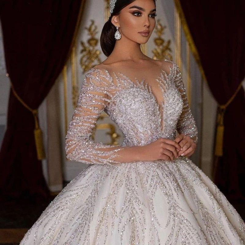 Middle East Dubai Arabic Ball Gown Wedding Dresses Glitter Sequined Sheer Neck Long Sleeves Bridal Gowns Sexy Backless Chapel Train Shiny Vestidos De Novia CL2803