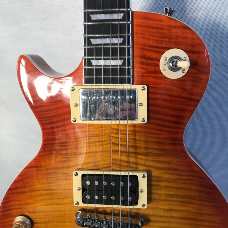 High quality new lp electric guitar, Sun top finish, tiger maple finish chrome accessories, mahogany. on left hand guitars