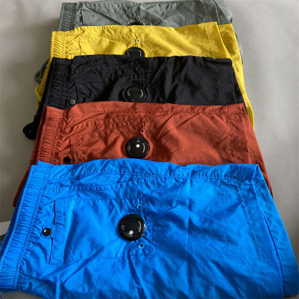 Yiciya shorts calças cp marca verão nova calça masculina juventude ao ar livre cor sólida esportes shorts de náilon solto casual calças de praia