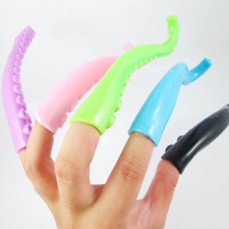 Nuovo romanzo Marionetta da dito in plastica Storia Tentacoli di polpo Giocattolo Silicone TPR Piccoli giocattoli da dito bambini Manica morbida Modalità mano sensoriale Scherzi Giocattolo Festa