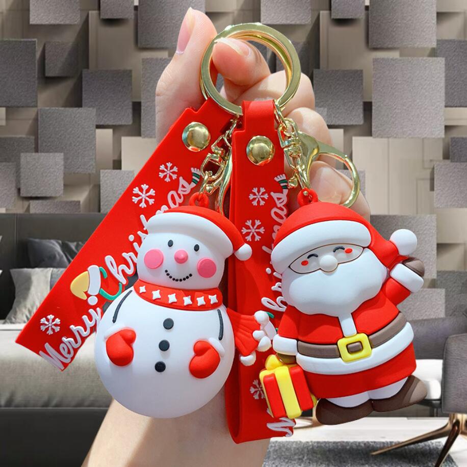 Portachiavi natalizio simpatico cartone animato Babbo Natale pupazzo di neve Portachiavi in PVC Portachiavi adorabile con caramelle di pan di zenzero Regali di Natale gli amici