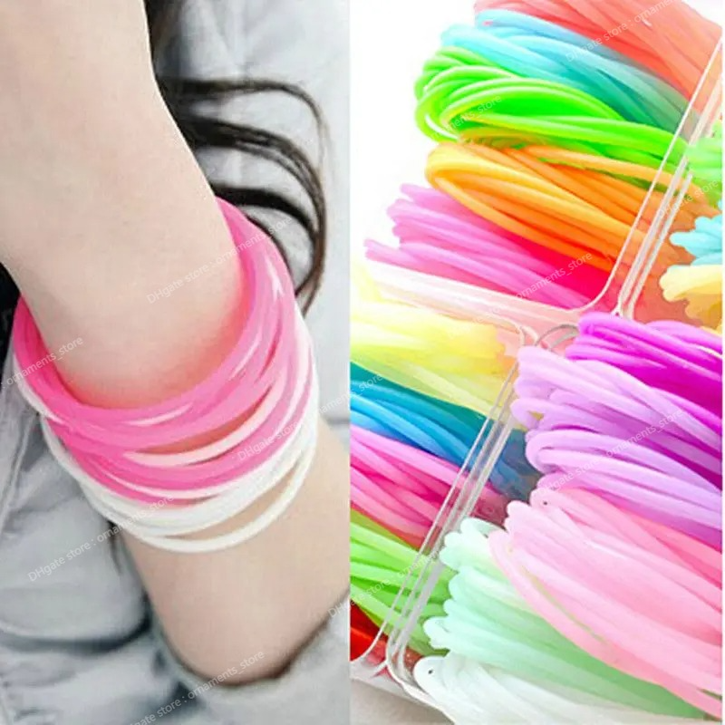 Venta al por mayor 20 UNIDS Neón Fluorescente Luminoso Pulseras de Silicona Pulsera Candy Gummy Hairband Brazaletes Unisex Pulsera de Goma Resplandor Joyería de Moda Pulseras Altas