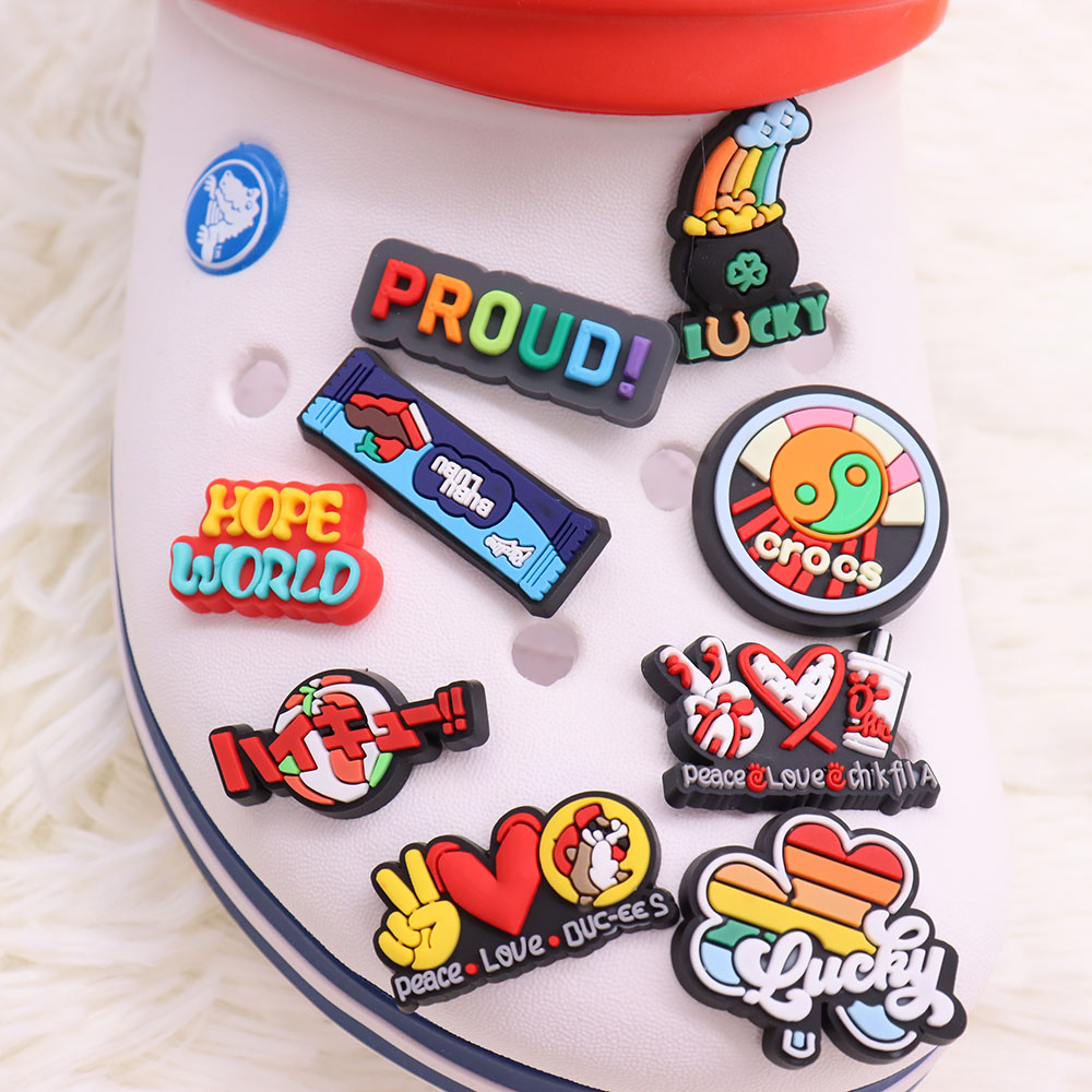 MOQ PVC Cartoon Proud Peace Love Lucky Rainbow Hope Four Leaf Clover Tai Chi Shoe Parts Accessories Designer Decorations Buckle Charms For Kids