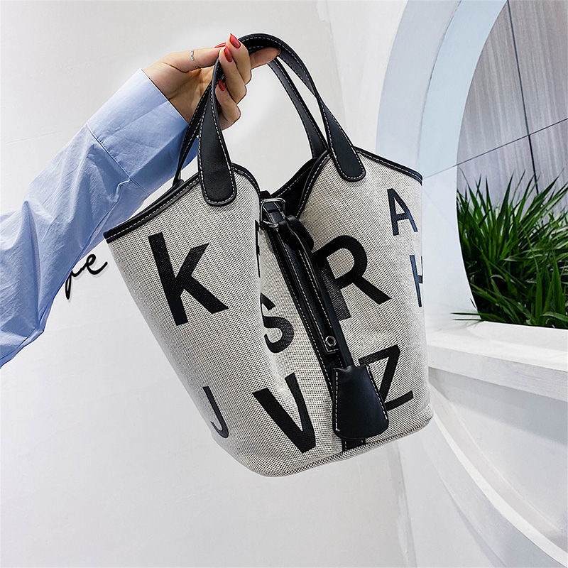 Minority design new fashion Joker canvas bag online celebrity simple portable bucket bag