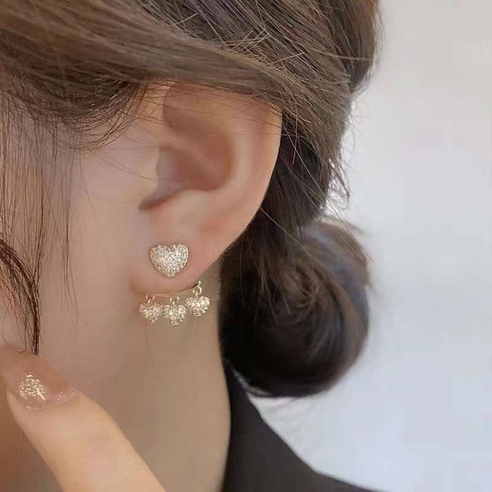 Tem Niche Simple personnalité Anti allergique conception Sier aiguille boucles d'oreilles devant arrière automne et hiver nouveau gland paty haut