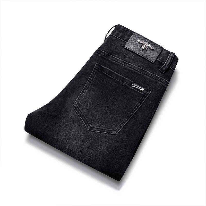 Heren Gouoi herfst jeans en winterstijl Koreaanse mode jeugd elastische slanke fit kleine voeten high-end merk broek9o4f